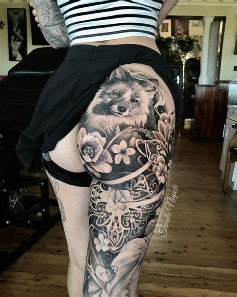 Thigh and bum tattoo women